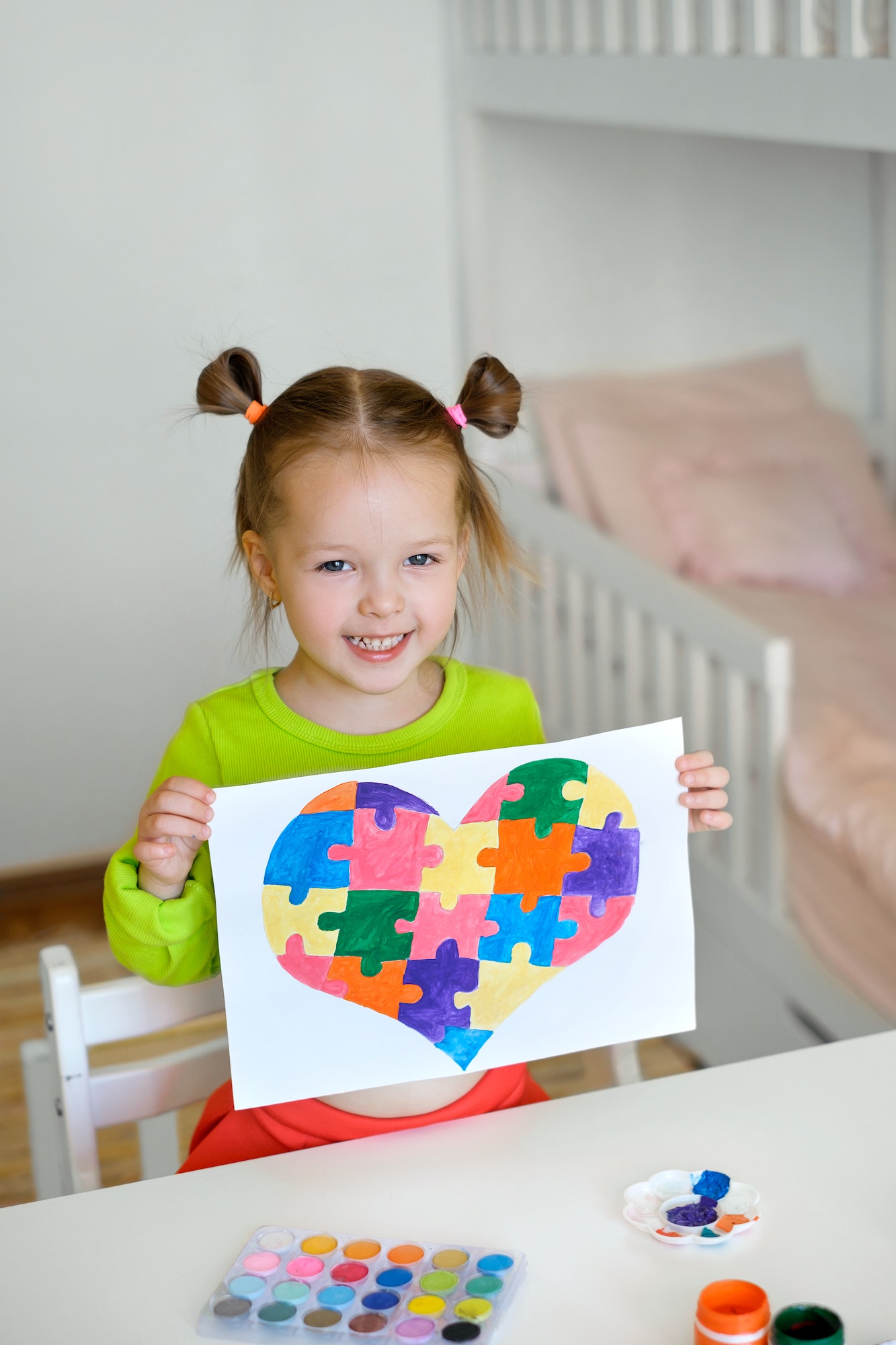 Kid drew a picture of a heart as a gift to a friend suffering from autism